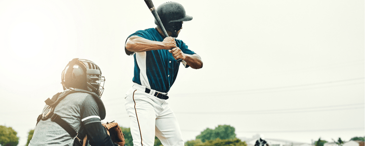 a baseball player about to swing